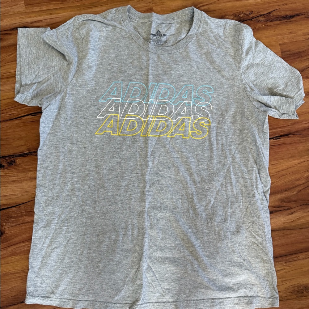 Adidas Light Gray Tee with Blue and Yellow Logo